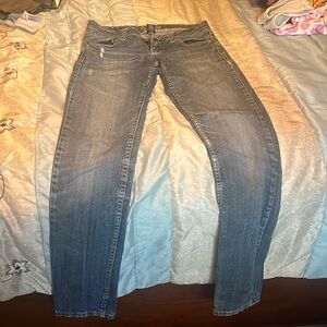 Amethyst, low rise, tall skinny jeans. Light stretch.